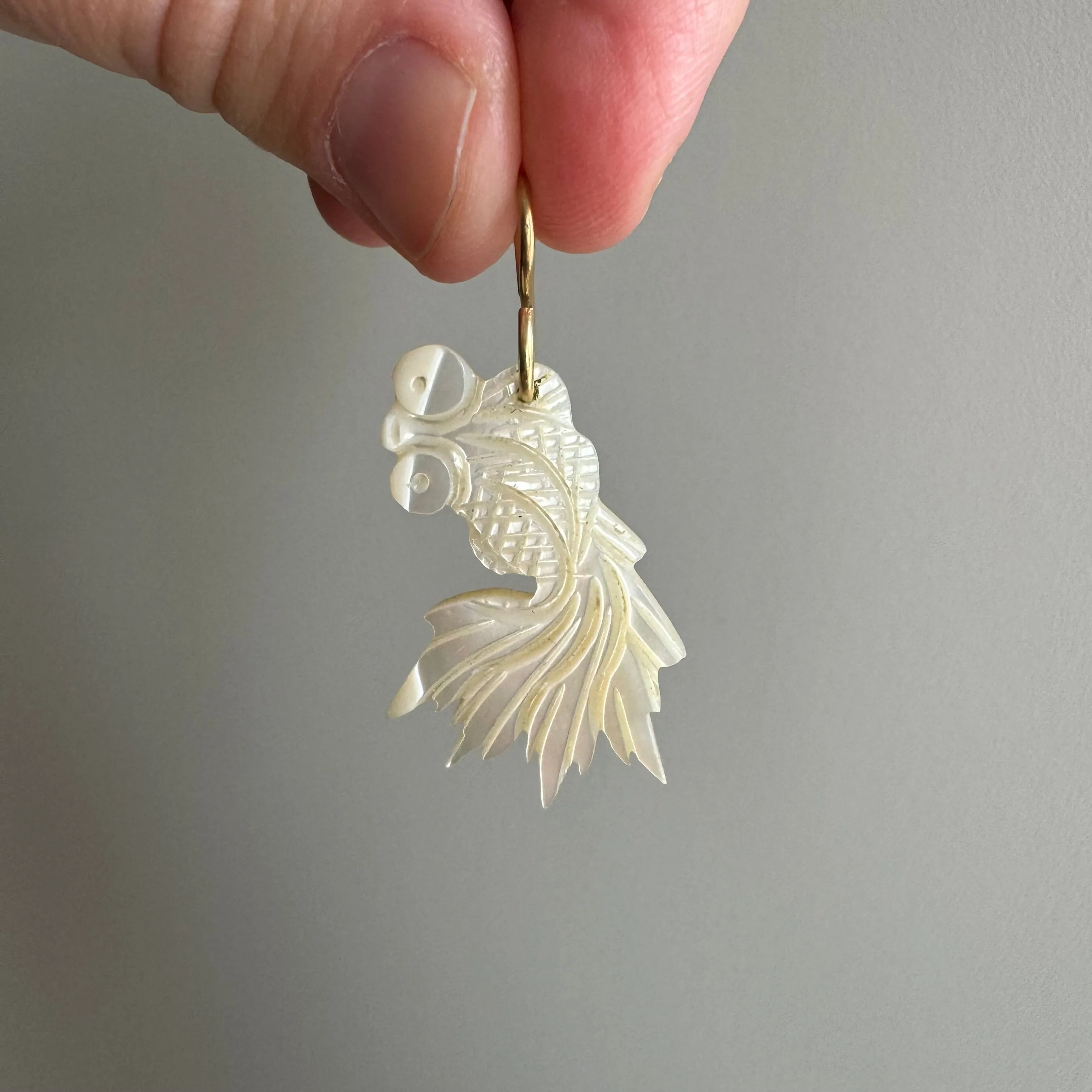 V I N T A G E // lucky fish / carved mother of pearl fish with 14k yellow gold bail / a pendant